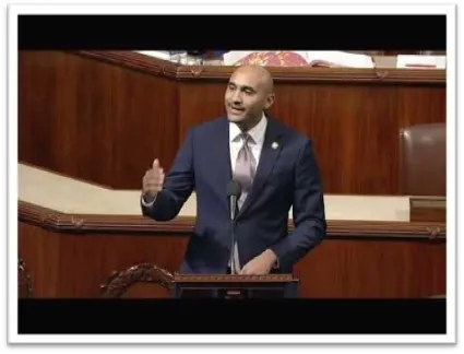 Congressman Figures speaking at podium on house floor